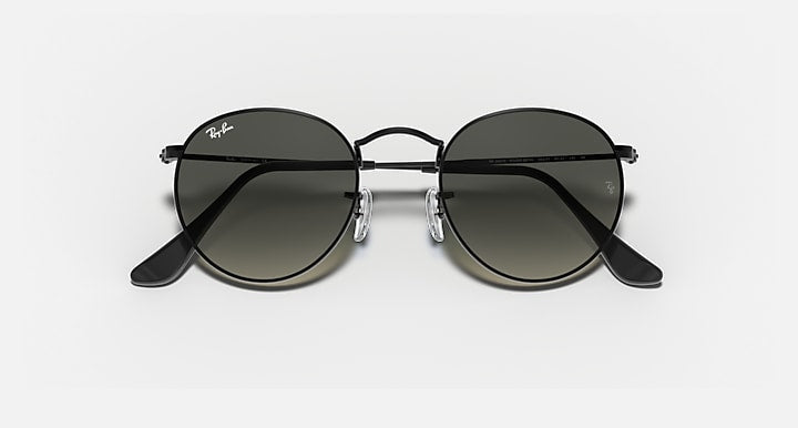 Black round sunglasses with dark lenses, front view with curved temples