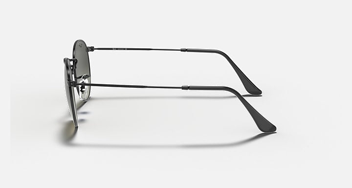 Black metal sunglasses with dark lenses, side profile