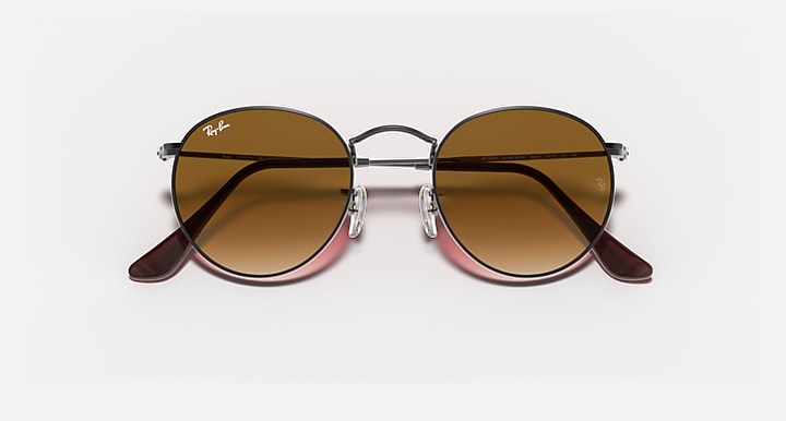 Ray-Ban RB3447N round sunglasses with silver frame, brown lenses, dark brown temples