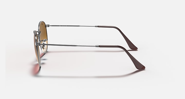 Ray-Ban RB3447N side view sunglasses with silver frame and dark brown temple tips