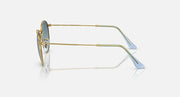 Ray-Ban round metal sunglasses side view with gold frame and blue lens tint