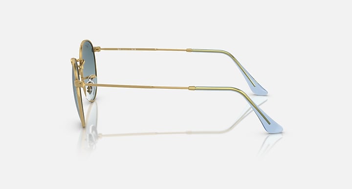 Ray-Ban round metal sunglasses side view with gold frame and blue lens tint
