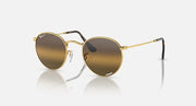 Round metal sunglasses with gold-tone frame and brown gradient tinted lenses