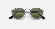 Round metal sunglasses with dark green mirrored lenses and black temple details, front view