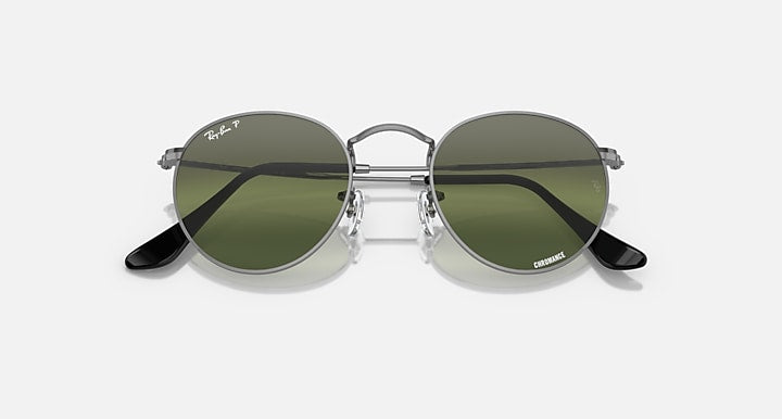 Round metal sunglasses with dark green mirrored lenses and black temple details, front view