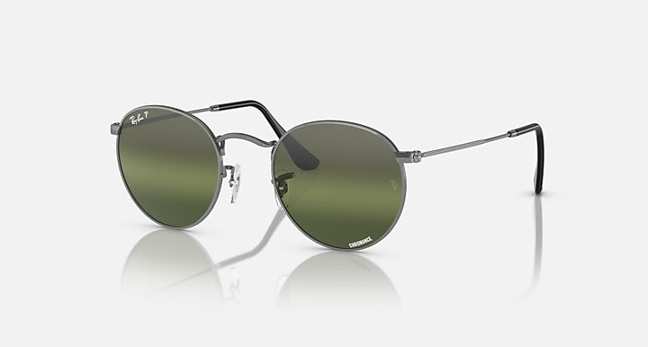 Round metal sunglasses with dark green mirrored lenses and dark gray frame, side view