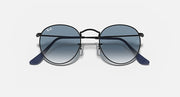 Ray-Ban round metal sunglasses with dark frame and gray lenses