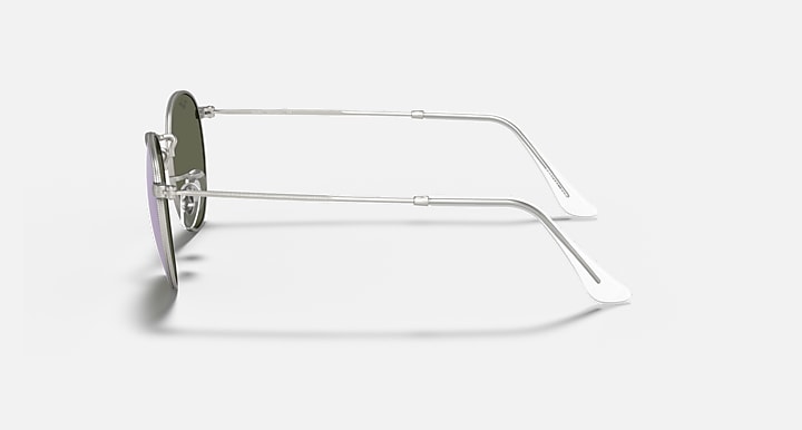 Round metal sunglasses side view with silver frame and light gray lenses
