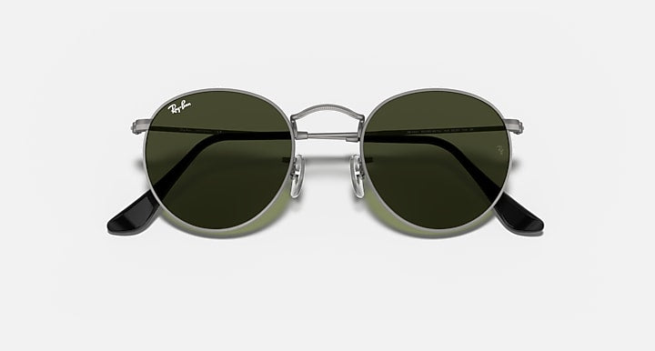 Ray-Ban round metal sunglasses with dark green lenses and black temple arms
