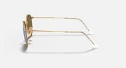 Gold metal round sunglasses with clear-white temple tips and blue lens