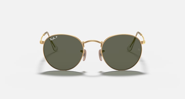 Round metal sunglasses front view with gold frame and dark green lenses