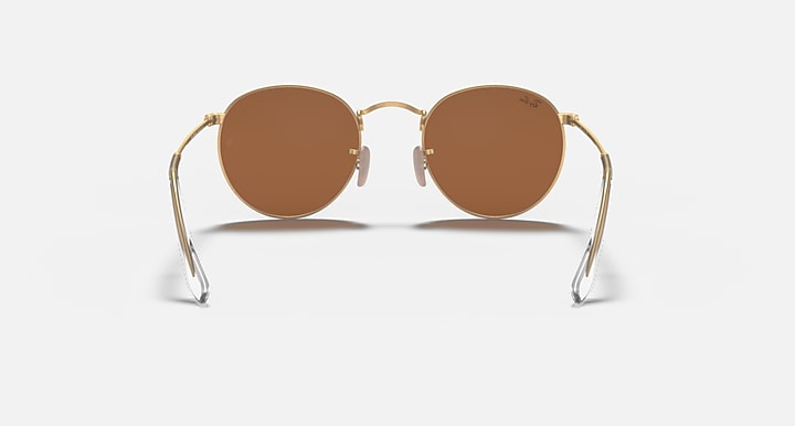 Round metal sunglasses with bronze frame and brown tinted mirrored lenses