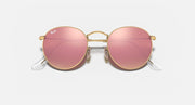 Round metal sunglasses with gold frame and pink gradient mirrored lenses