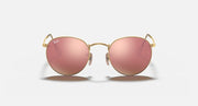 Round metal sunglasses with gold frame and rose-pink mirrored lenses
