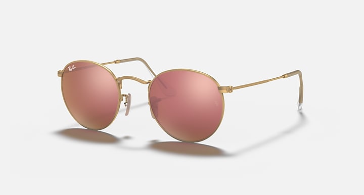 Round metal sunglasses with gold frame and pink mirrored lenses