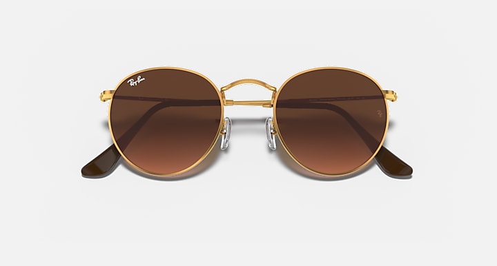 Round metal sunglasses with gold frame, dark brown lenses, black temple arms