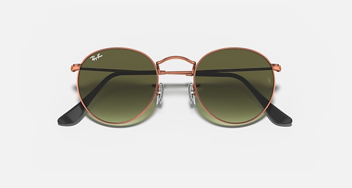 Round metal sunglasses with rose-gold frame and olive tinted lenses, black arms