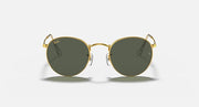 Round metal sunglasses with gold frame and dark green mirrored lenses, front view close-up.