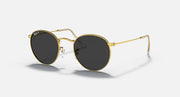 Gold round metal sunglasses with dark smoke lenses and slim clear nose pads.