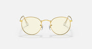 Round metal sunglasses front view with light gold frames and pale tinted lenses