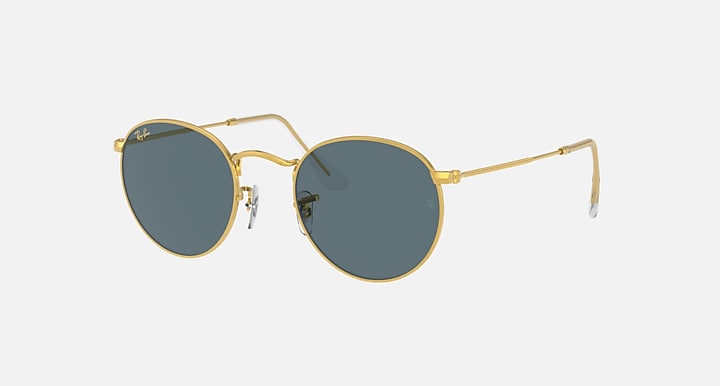 Gold round metal sunglasses with blue-tinted lenses and slim clear nose pads.