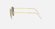 Gold round metal sunglasses in side profile with blue-tinted lenses and clear tips.