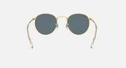 Gold round metal sunglasses with blue-tinted lenses and clear temple arms, front view.