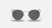 Round metal sunglasses with dark gray lenses and shiny silver frame, front view.