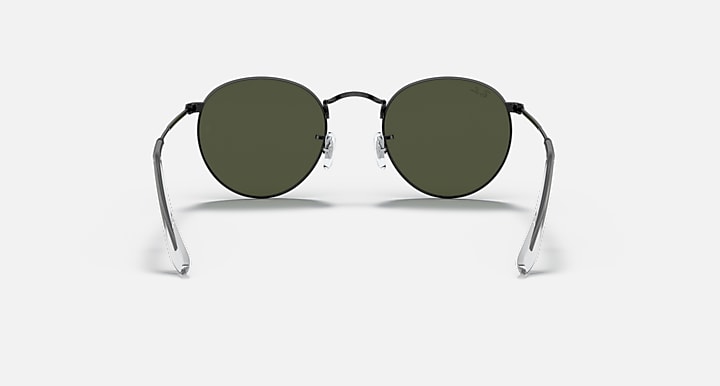 Round metal sunglasses with olive lenses and black frame, front view.