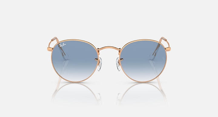 Round metal sunglasses by Ray-Ban, rose gold frames, blue mirrored lenses, straight-on