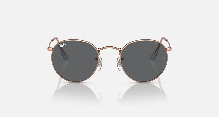 Round metal sunglasses with rose gold frames and dark tinted lenses, front view.