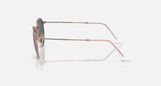 Round metal sunglasses with rose gold frames, side profile and temple tips.
