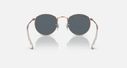 Round metal sunglasses with rose gold-tone frame and dark gray lenses