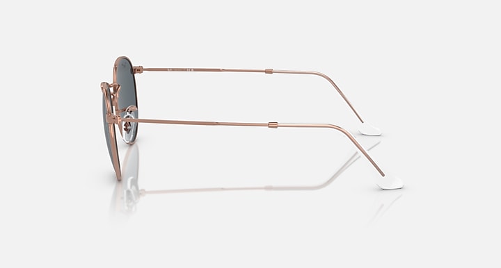 Rose gold-tone round sunglasses with metal frame and clear side temple profile