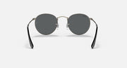Round metal sunglasses with dark frames and smoky gray lenses