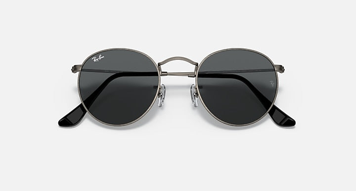 Round metal sunglasses with dark frames and black tinted lenses