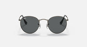 Round metal sunglasses with dark frames and deep charcoal tinted lenses