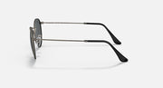 Round metal sunglasses side view with black metal frame and dark lenses
