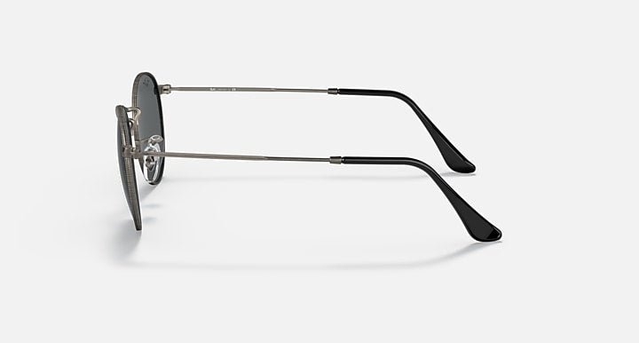 Round metal sunglasses side view with black metal frame and dark lenses
