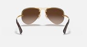 Ray-Ban aviator sunglasses with gold frame and brown gradient lenses, front view