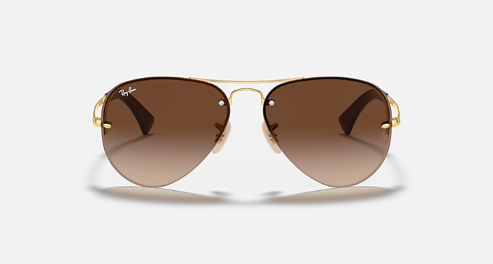 Ray-Ban aviator sunglasses with gold frame and brown lenses, front view