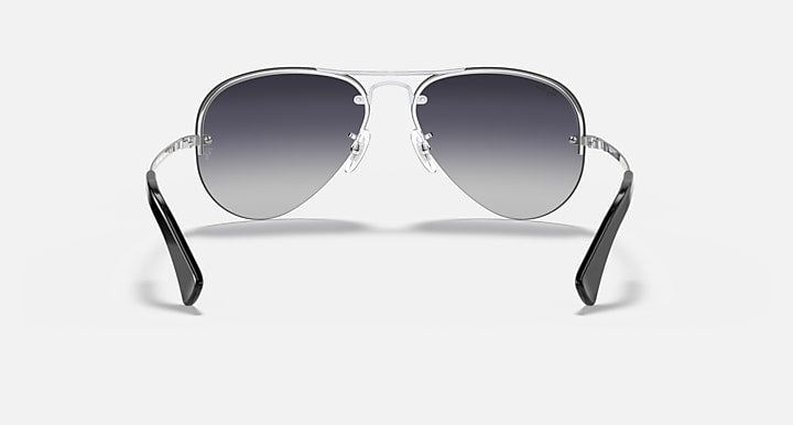 Ray-Ban aviator sunglasses with silver frame and dark gray gradient lenses, front view