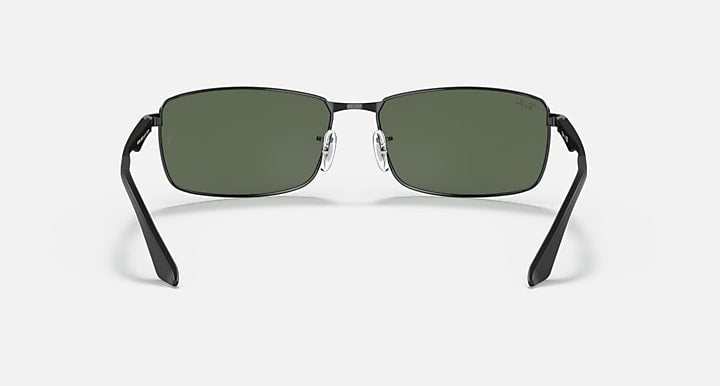 Ray-Ban RB3498 sunglasses with dark green lenses and black frame, front view