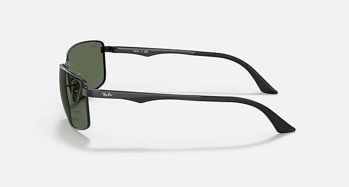 Ray-Ban RB3498 sunglasses with dark green lenses and black frame, side profile view