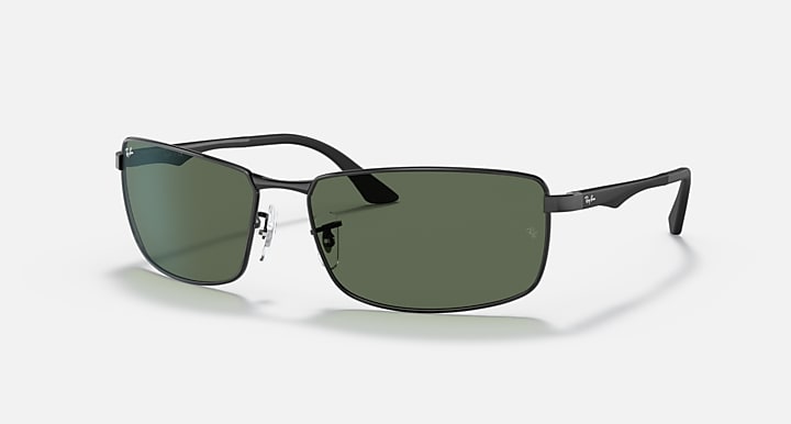 Ray-Ban RB3498 sunglasses with dark green lenses and matte black frame, angled front view