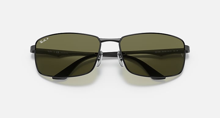 Ray-Ban RB3498 sunglasses, dark olive lenses, black frame, close front view