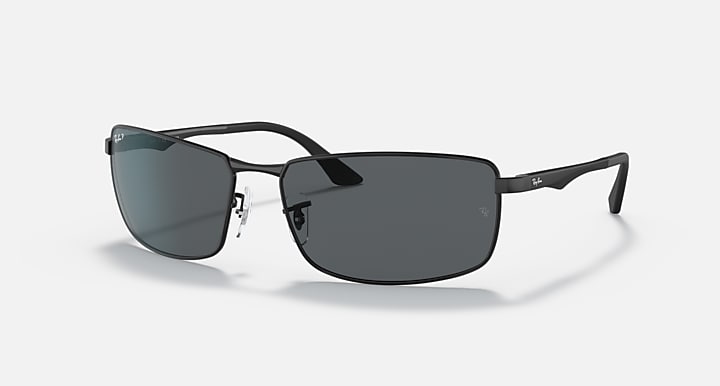 Ray-Ban RB3498 sunglasses with dark gray lenses and matte black frame, angled front view
