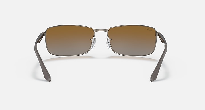 Ray-Ban RB3498 sunglasses with rectangular brown gradient lenses and silver-tone metal frame, front