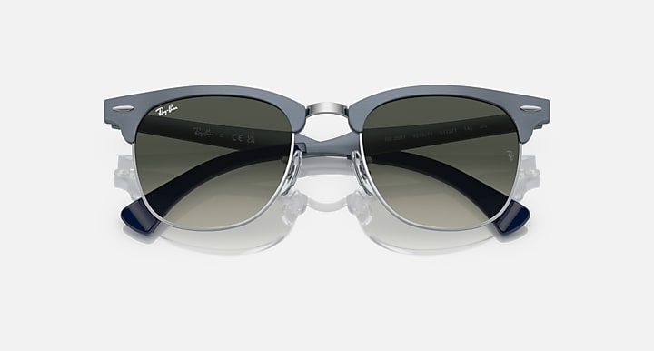 Ray-Ban clubmaster aluminum sunglasses with dark green lenses and metal frame, angled front view