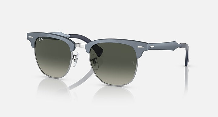 Ray-Ban clubmaster aluminum sunglasses with dark green lenses and metal frame, side-front view